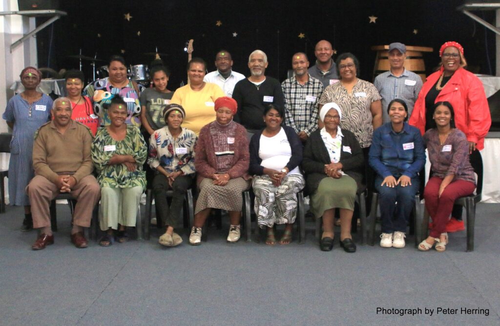 Gender Equity and Reconciliation International Facilitators and Participants small group gathering